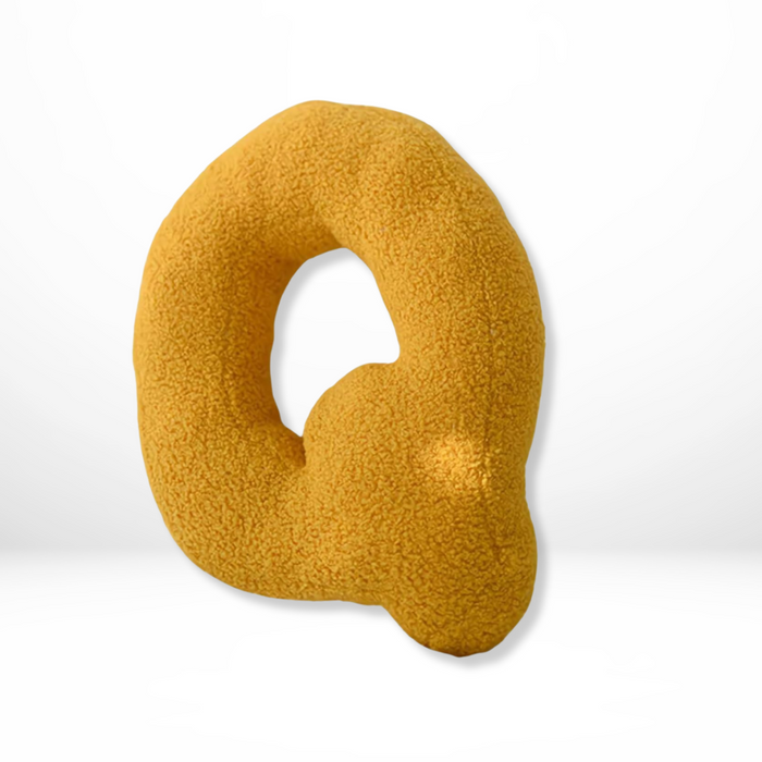 Dekorativ alfabetpude med fløjlsstruktur til boligindretning