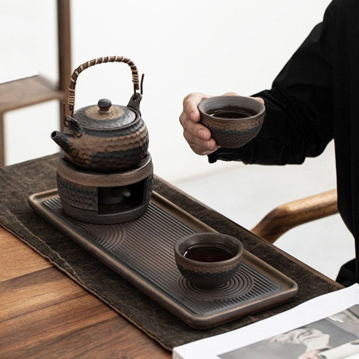 Japanilainen keraaminen teesarja lämpöpidikkeellä rauhaan ja eleganssiin