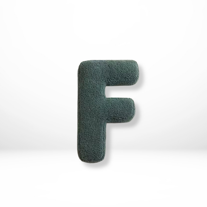 Dekorativ alfabetpude med fløjlsstruktur til boligindretning