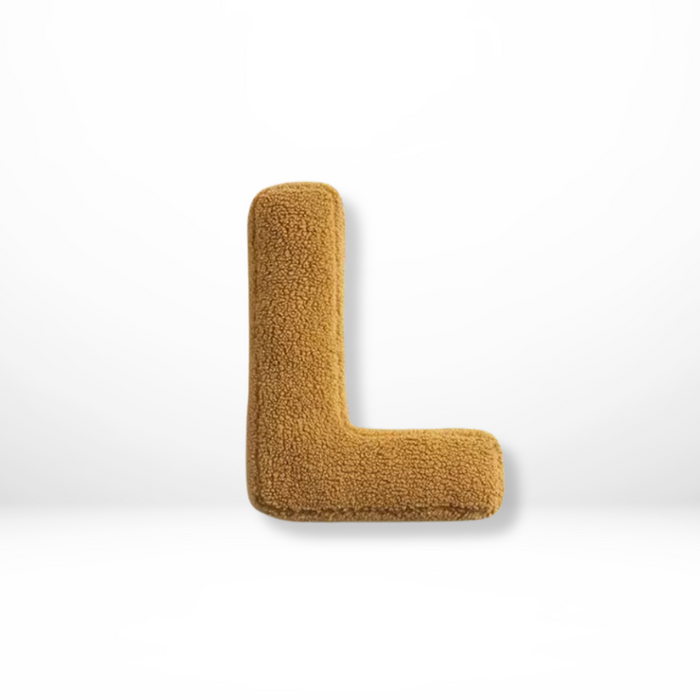 Dekorativ alfabetpude med fløjlsstruktur til boligindretning