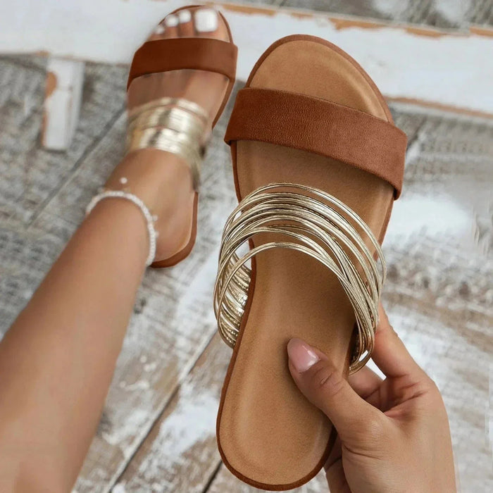 Naisten slip-on-sandaalit mukavalla pohjalla ja koristeellisilla remmeillä
