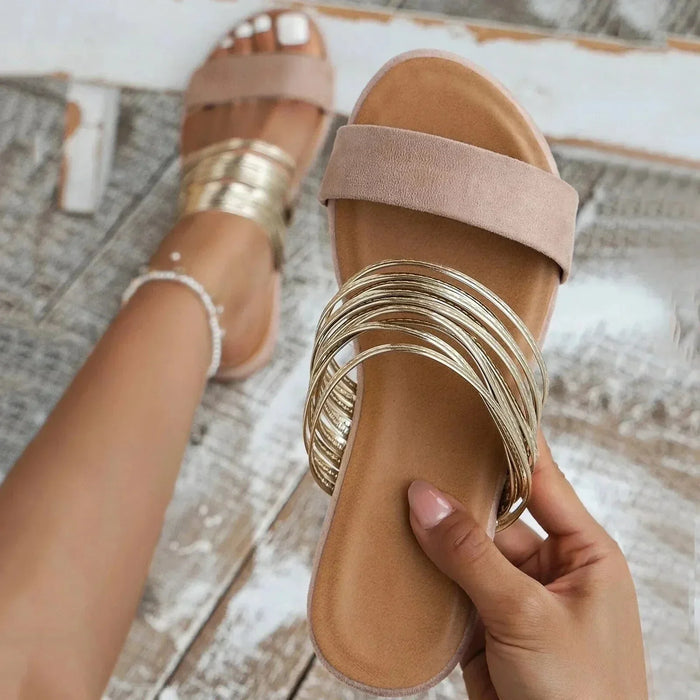 Naisten slip-on-sandaalit mukavalla pohjalla ja koristeellisilla remmeillä