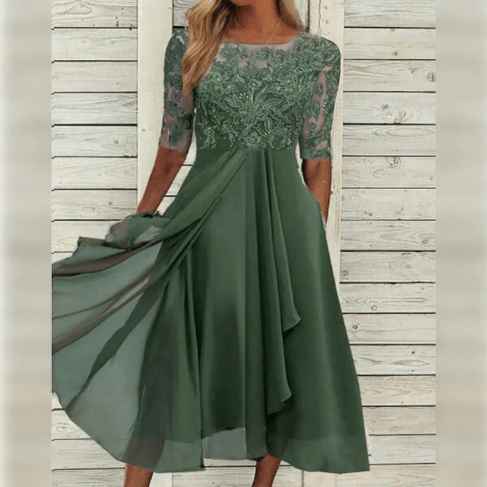 Elegantti midi-mekko pitsiyksityiskohdilla ja laskeutuvalla helmalla juhlahetkiin