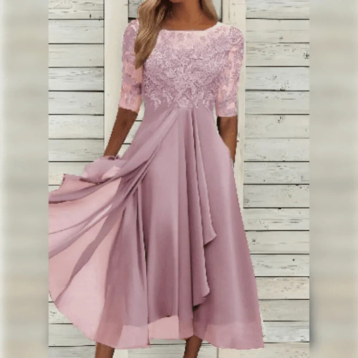 Elegantti midi-mekko pitsiyksityiskohdilla ja laskeutuvalla helmalla juhlahetkiin